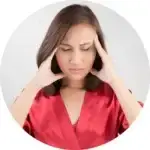 Woman suffering from a migraine
