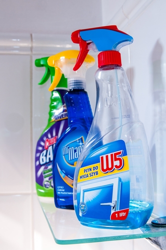 Cleaning products on a shelf.