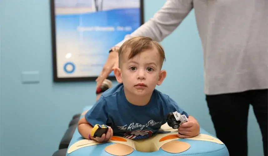 baby boy during a pediatric adjustment